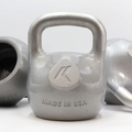 Silver kettlebell with 'Atlas' branding and 'Made in USA' text on a white background
